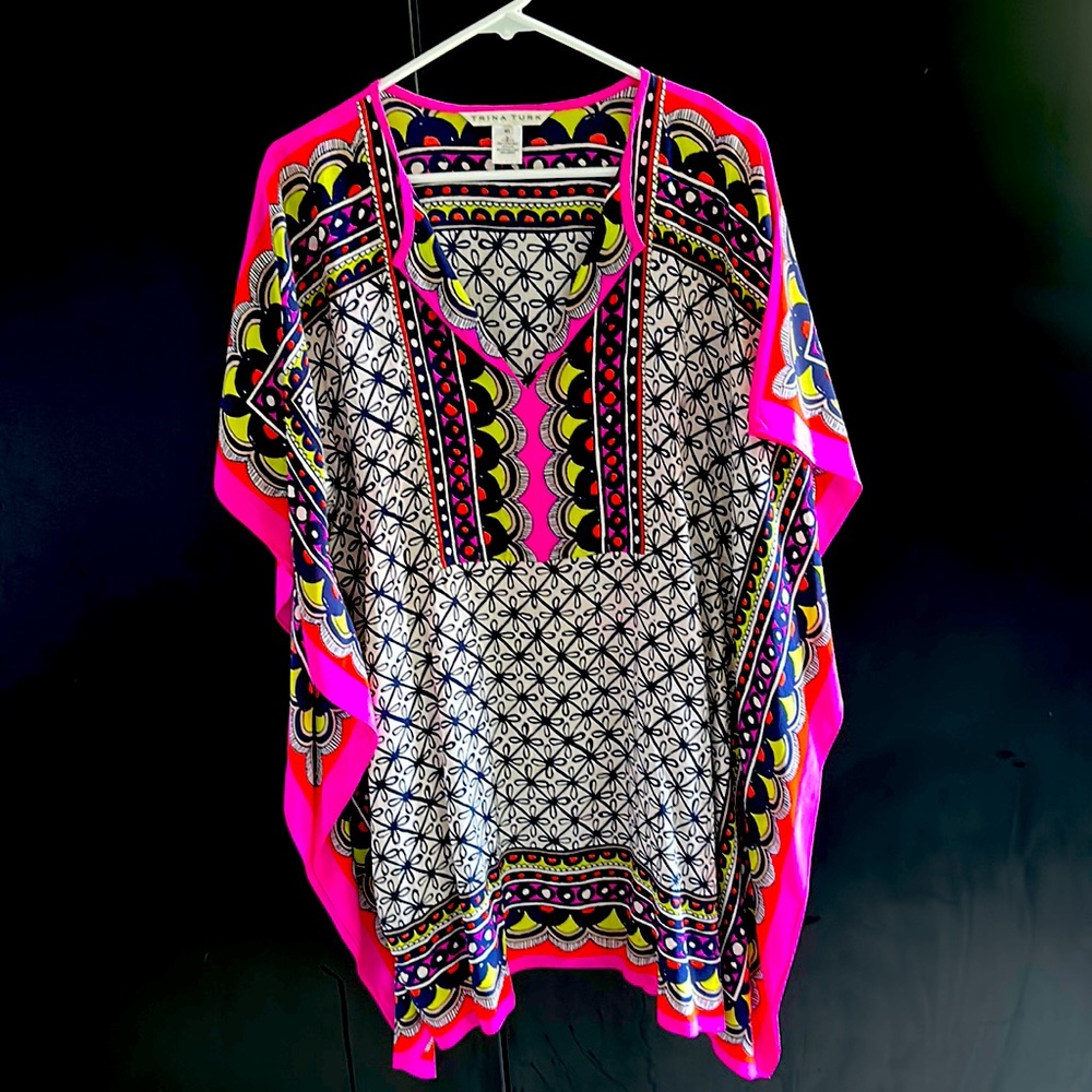 Lost weight and it’s big for me.  Silky fabric. Fun and easy to wear.